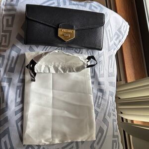 Prada Black Clutch with Gold Accent